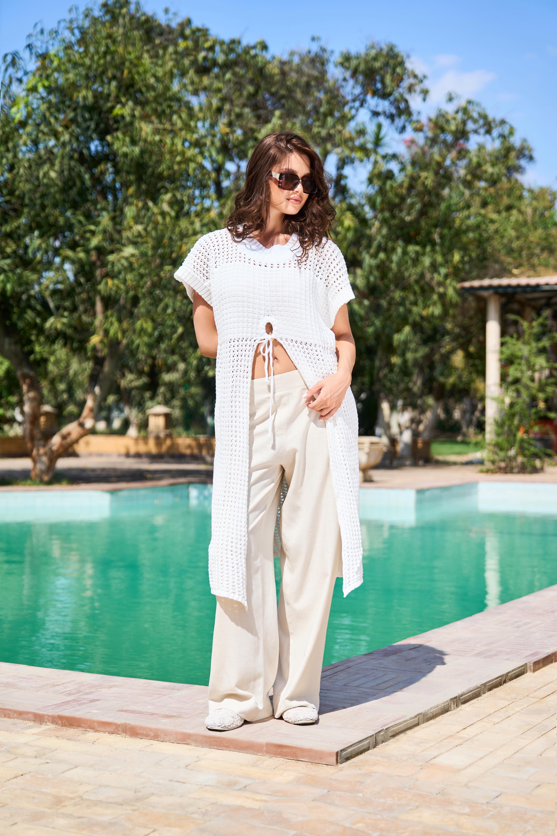 Knitted long open front body