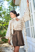 Cascade Ruffle Tie-Neck Top
